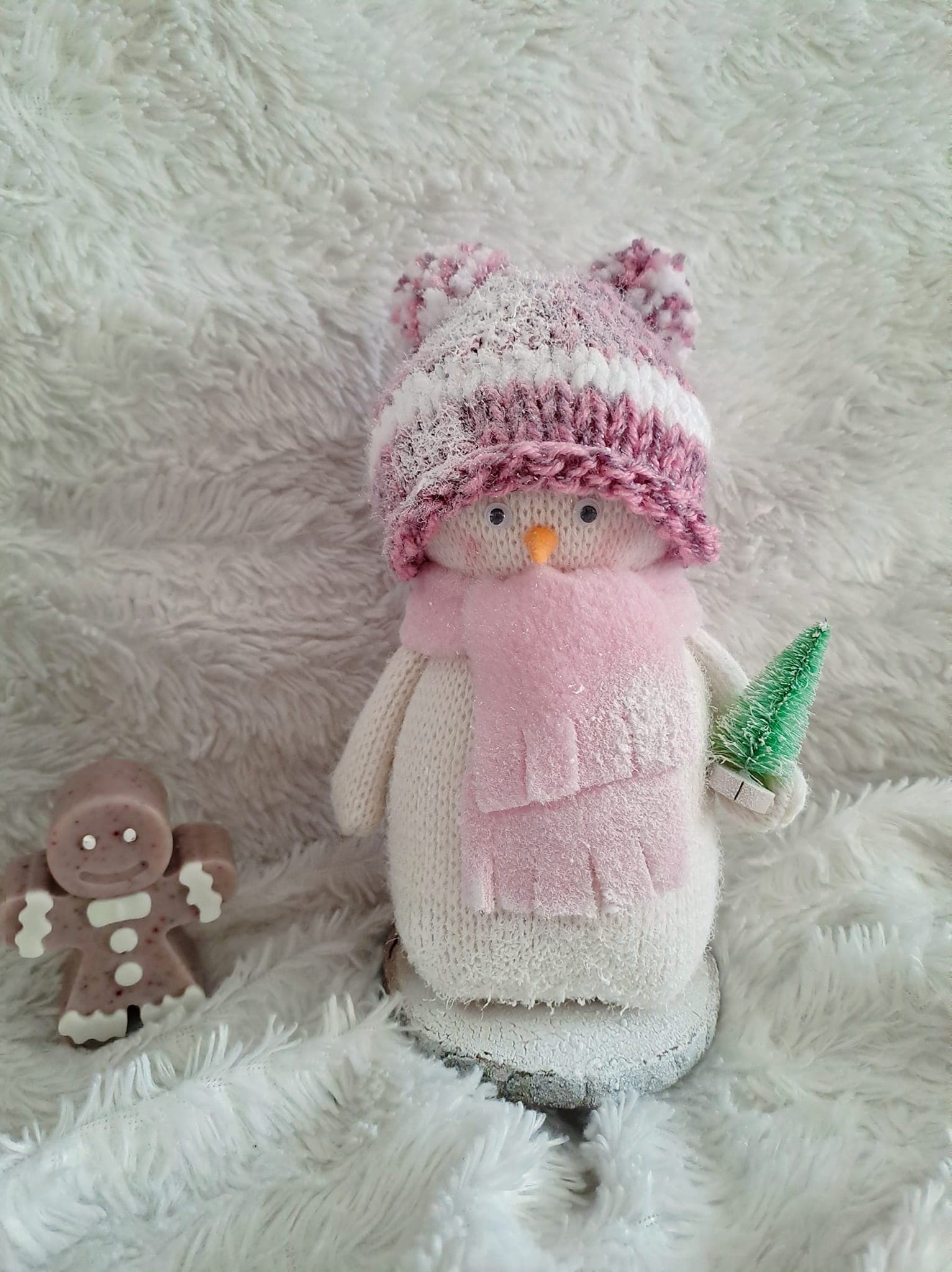 Camelia's creative workspace filled with materials and tools